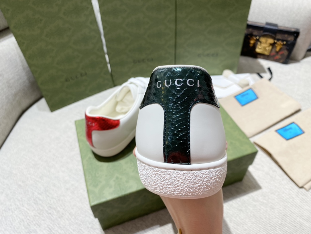 G*u*i sneakers