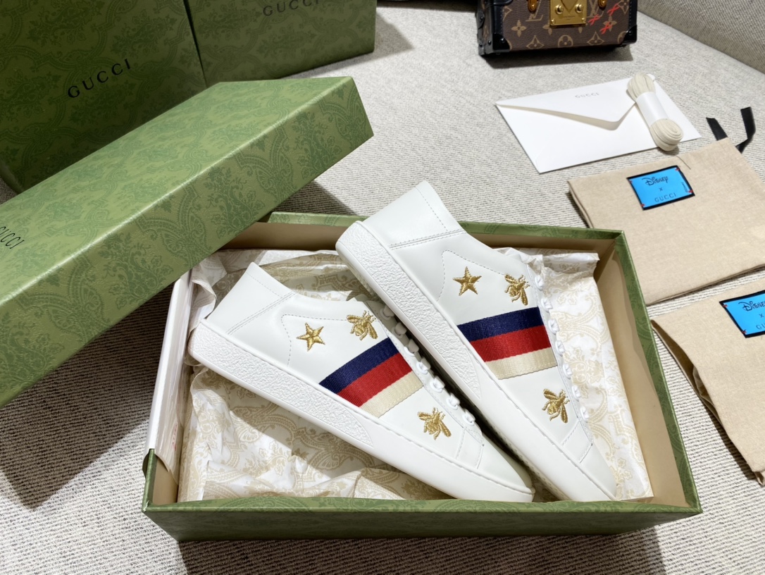 G*u*i sneakers