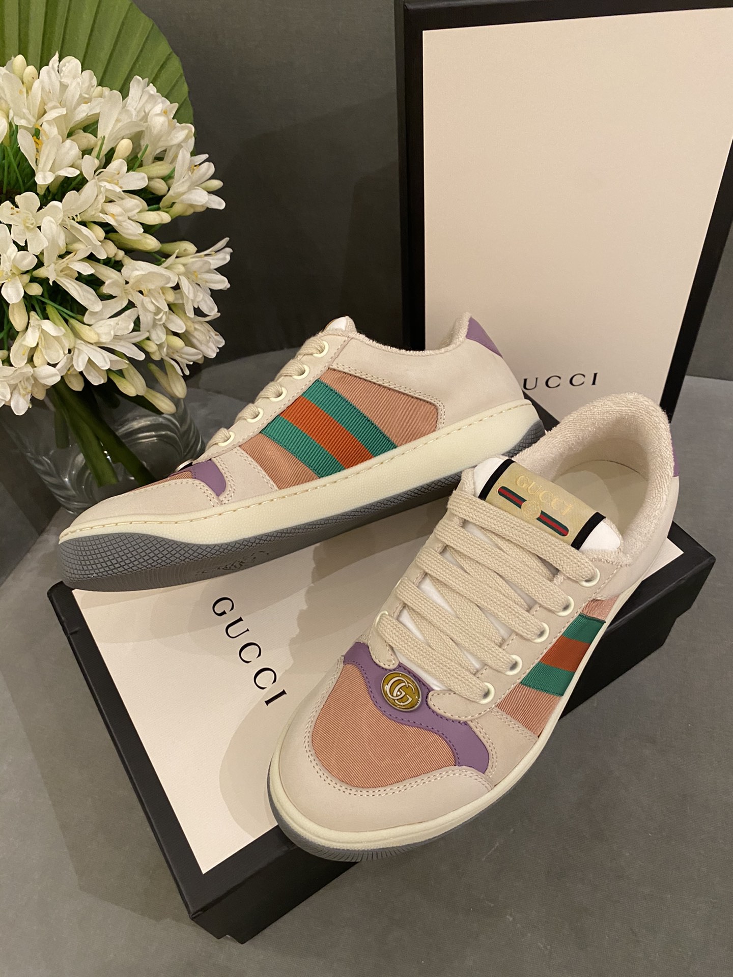 G*u*i sneakers
