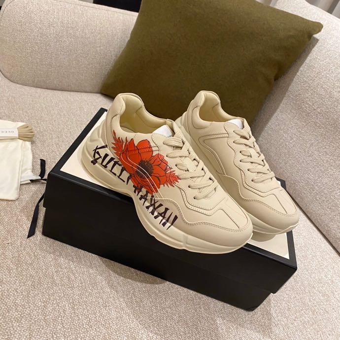 G*u*i sneakers
