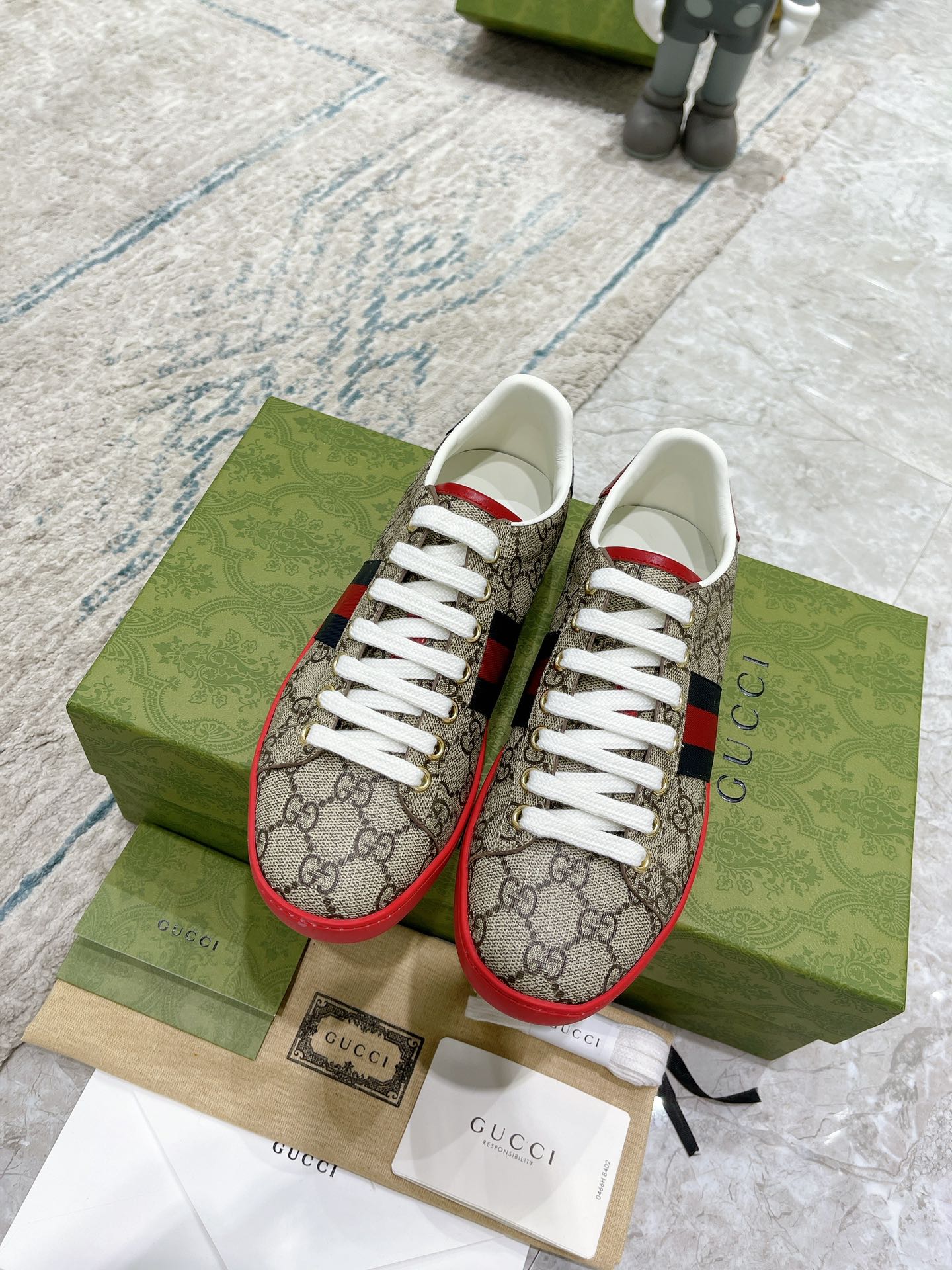 G*u*i sneakers