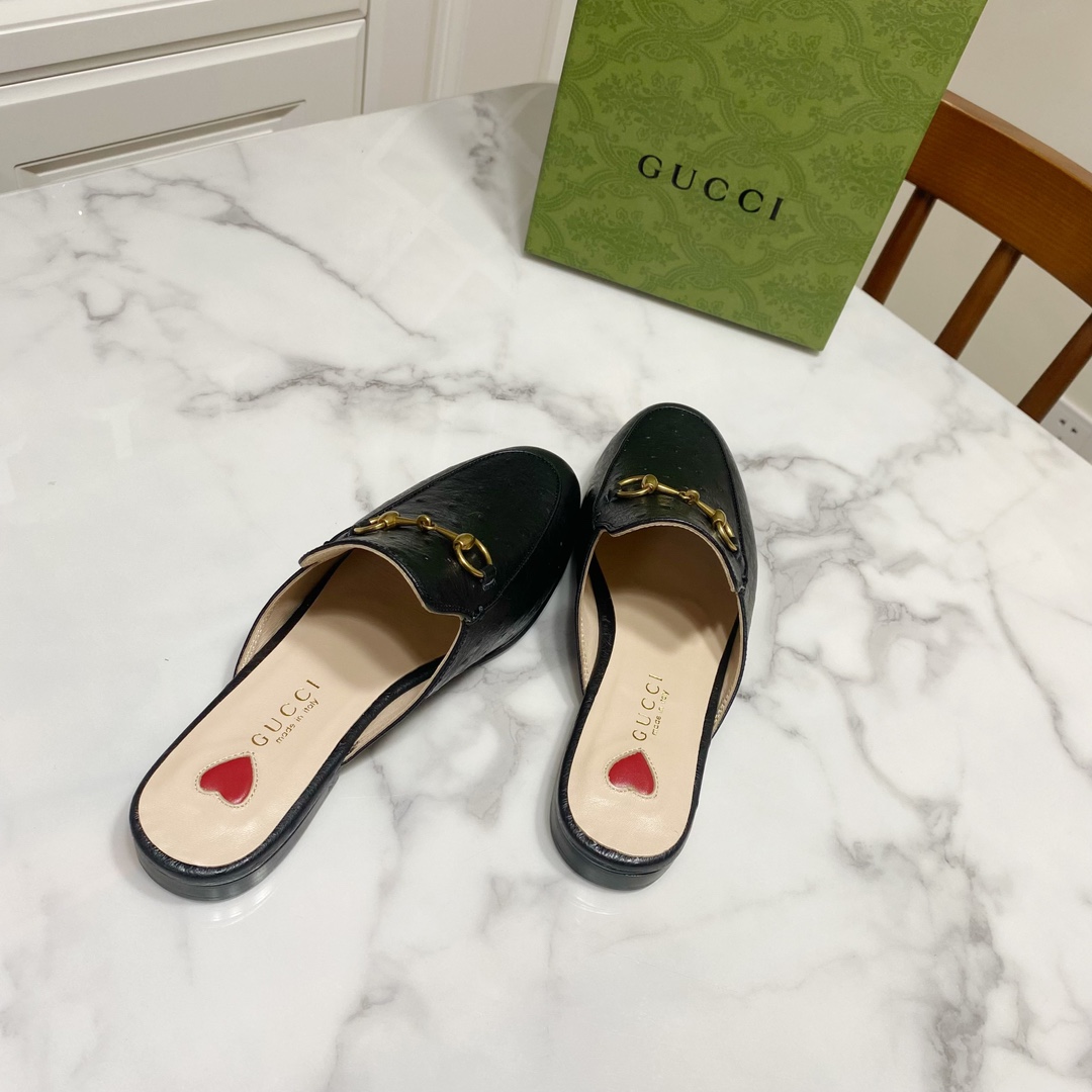 G*u*i loafers