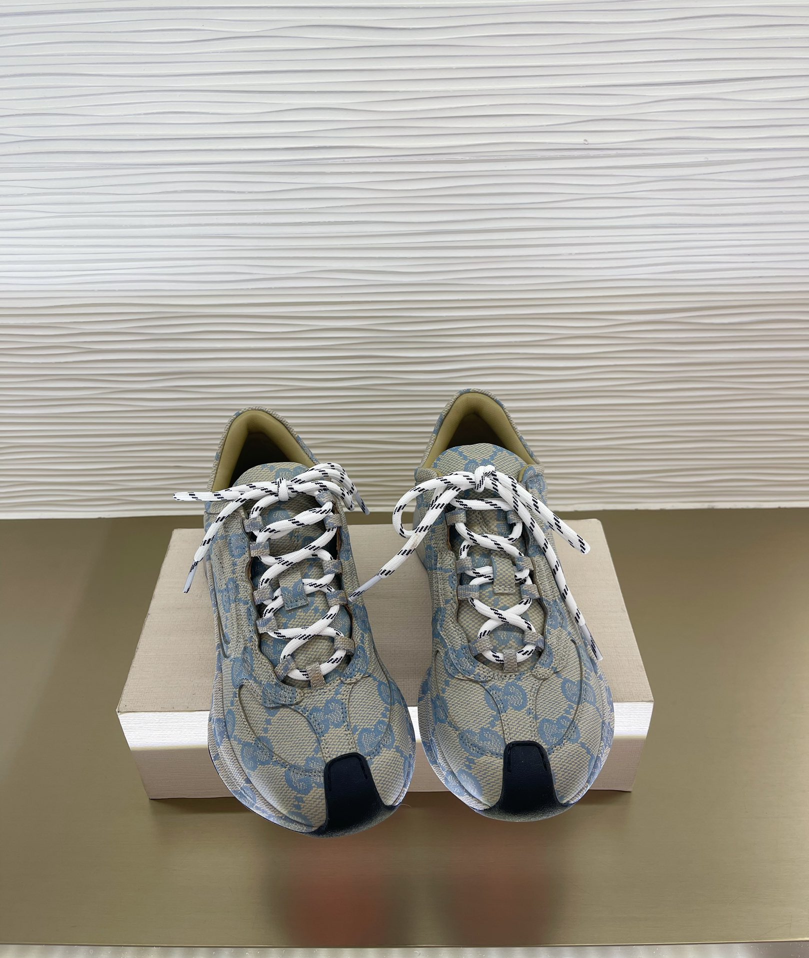 G*u*i sneakers