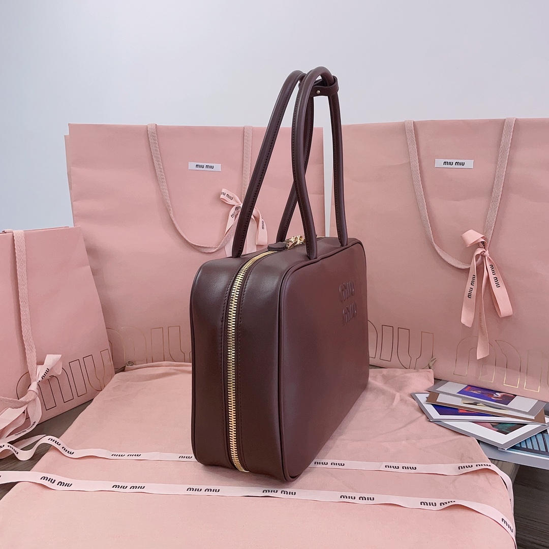 M*um*u leather top handbag-34x23x12cm