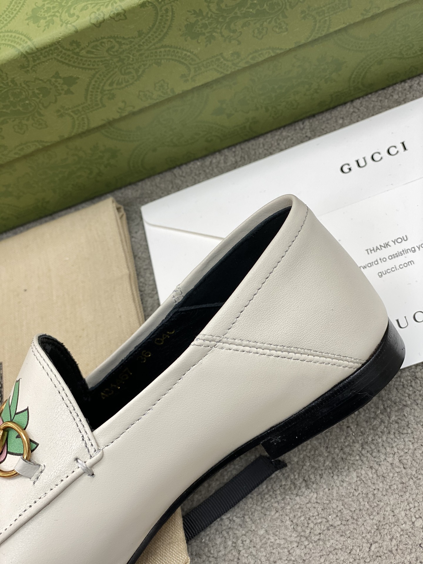 G*u*i loafers
