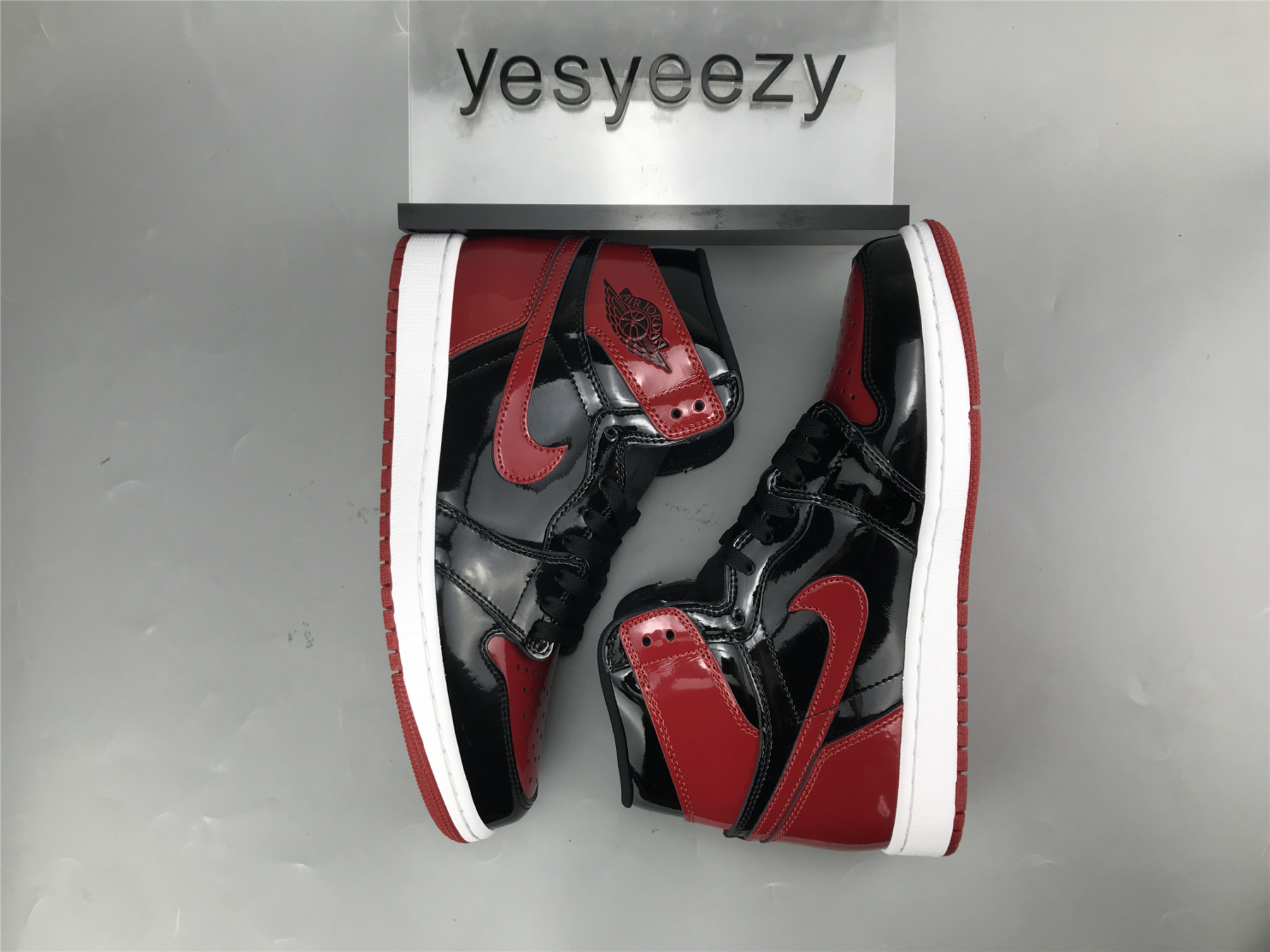 UA AIR JORDAN 1 RETRO HIGH OG PATENT 