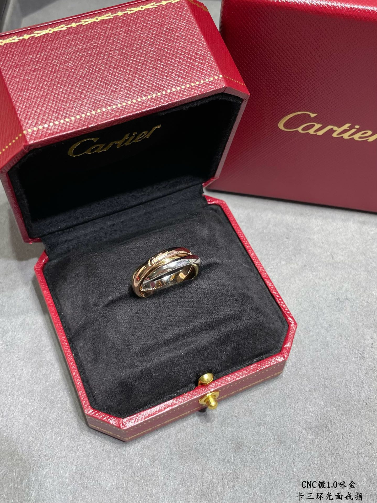 Ca*t1er three-ring polished ring