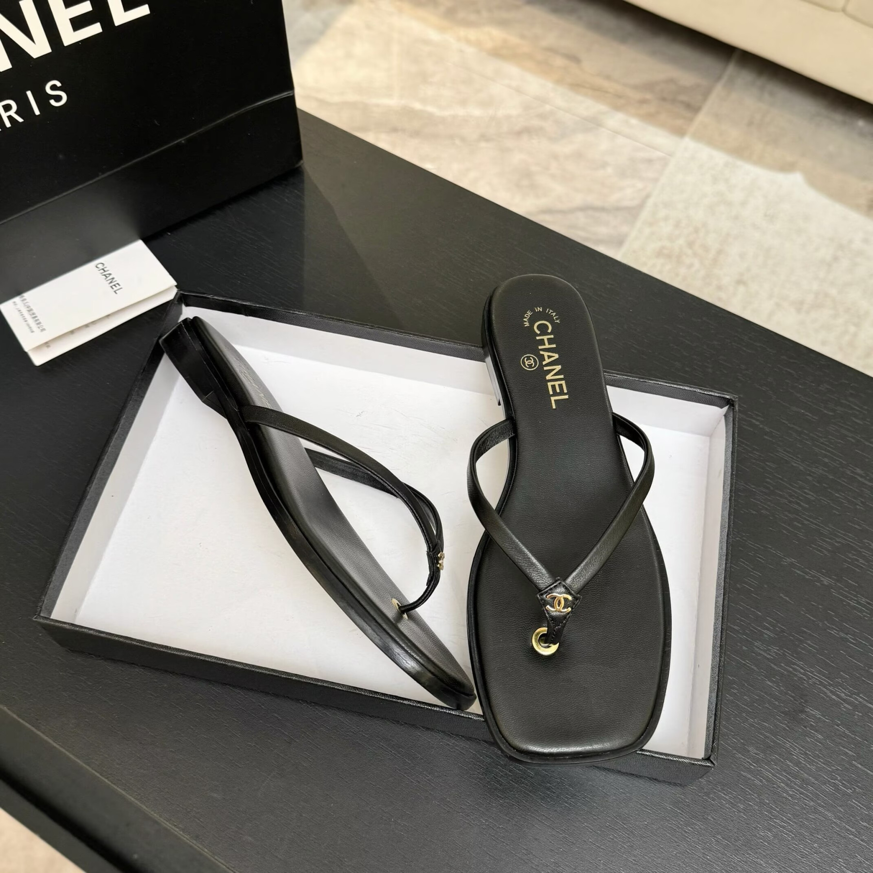 UA Ch**el Times Square Thong Sandals