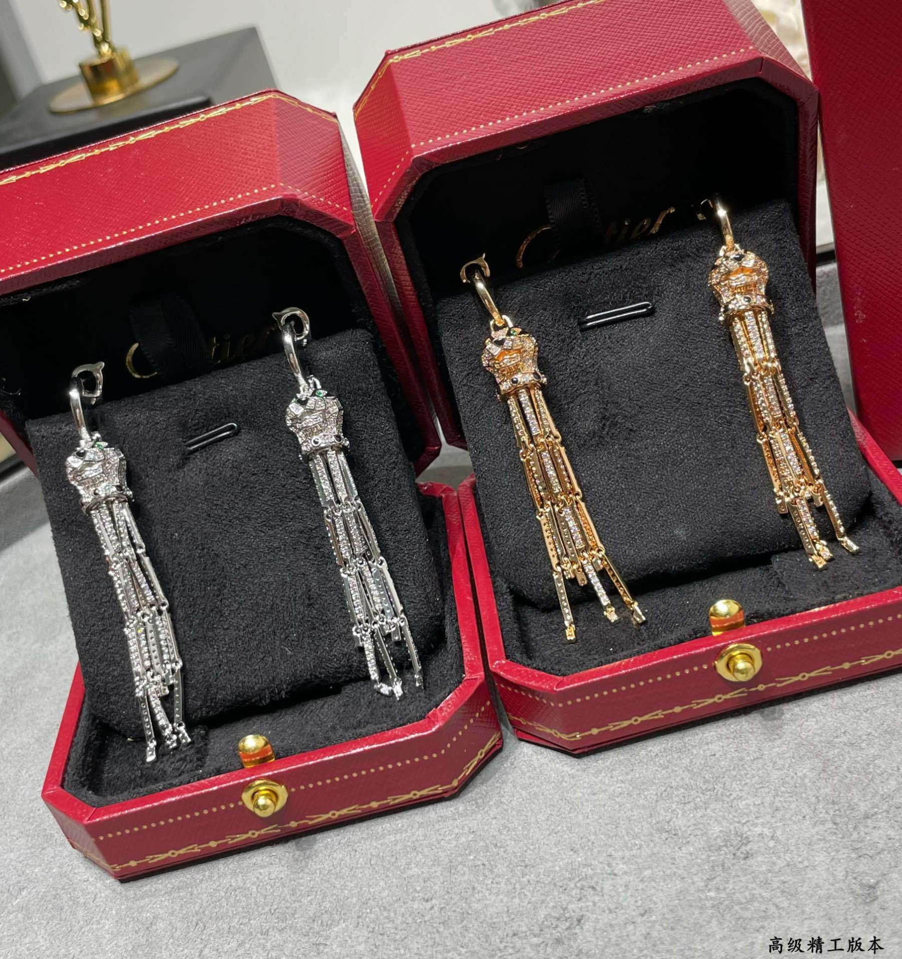 Ca*t1er Spotted Leopard Tassel Earrings