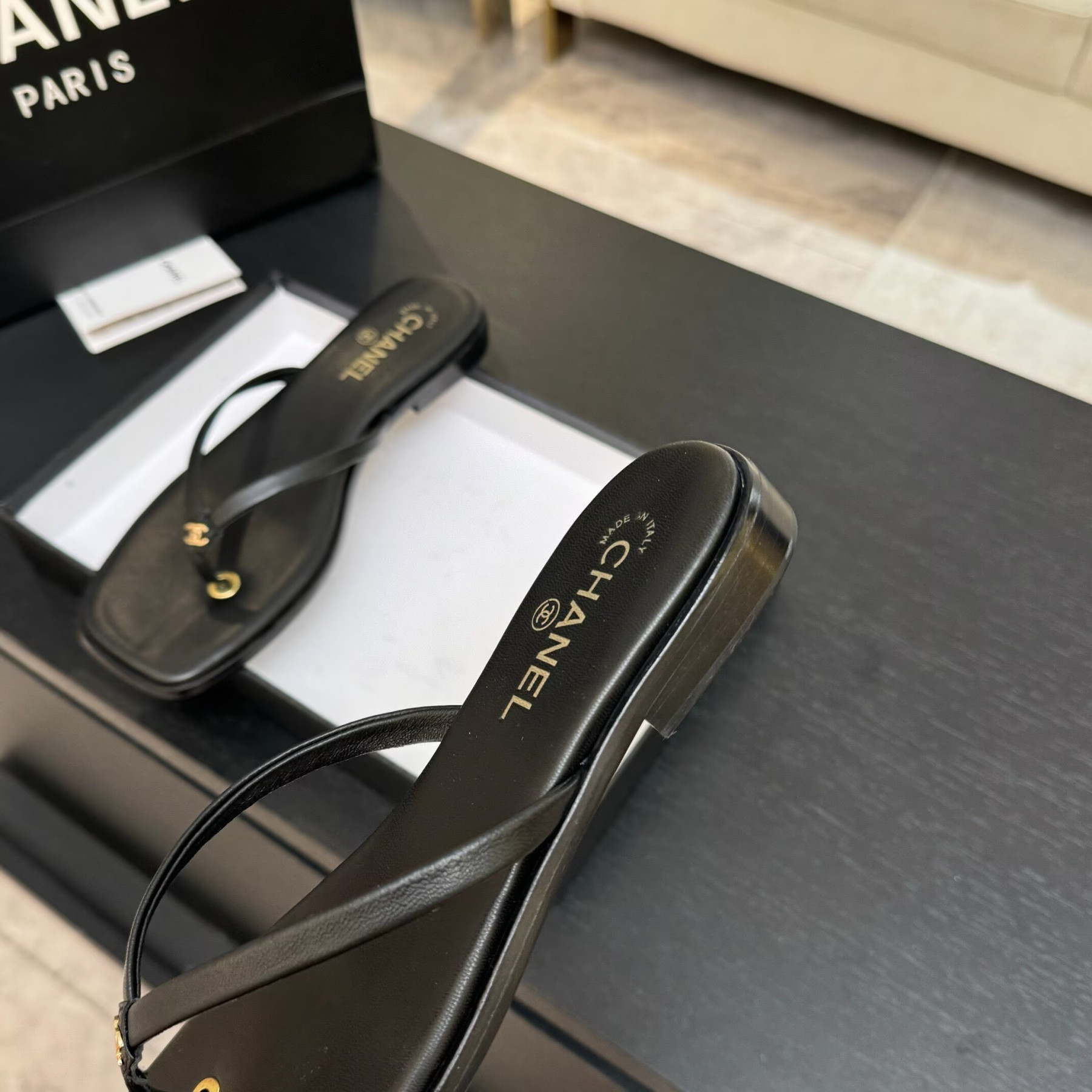 UA Ch**el Times Square Thong Sandals