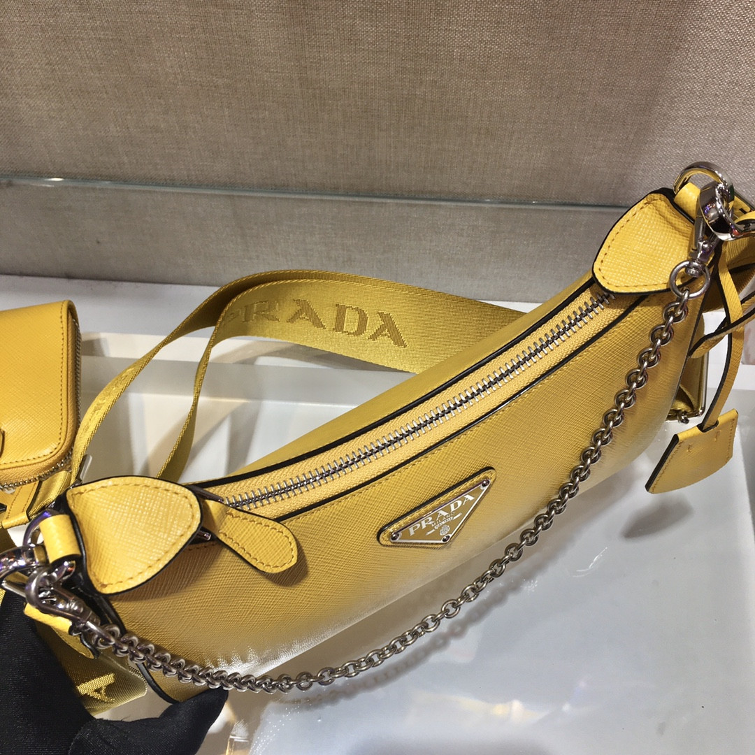Pra*a Re-Edition 2005 Saffiano leather bag dark yellow