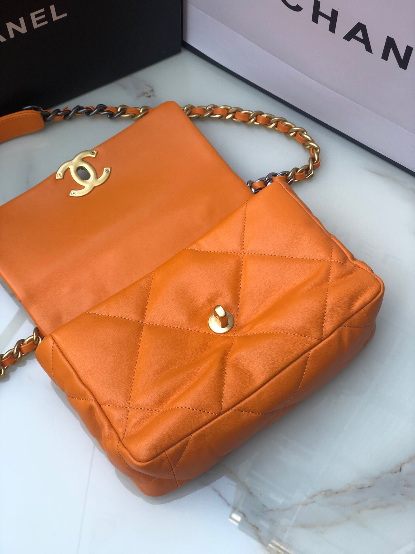 Ch**el 19 HANDBAG Shiny Leather, Gold-Tone, Silver-Tone & Ruthenium-Finish Metal Orange 6.2 × 10.1 × 3.5 in