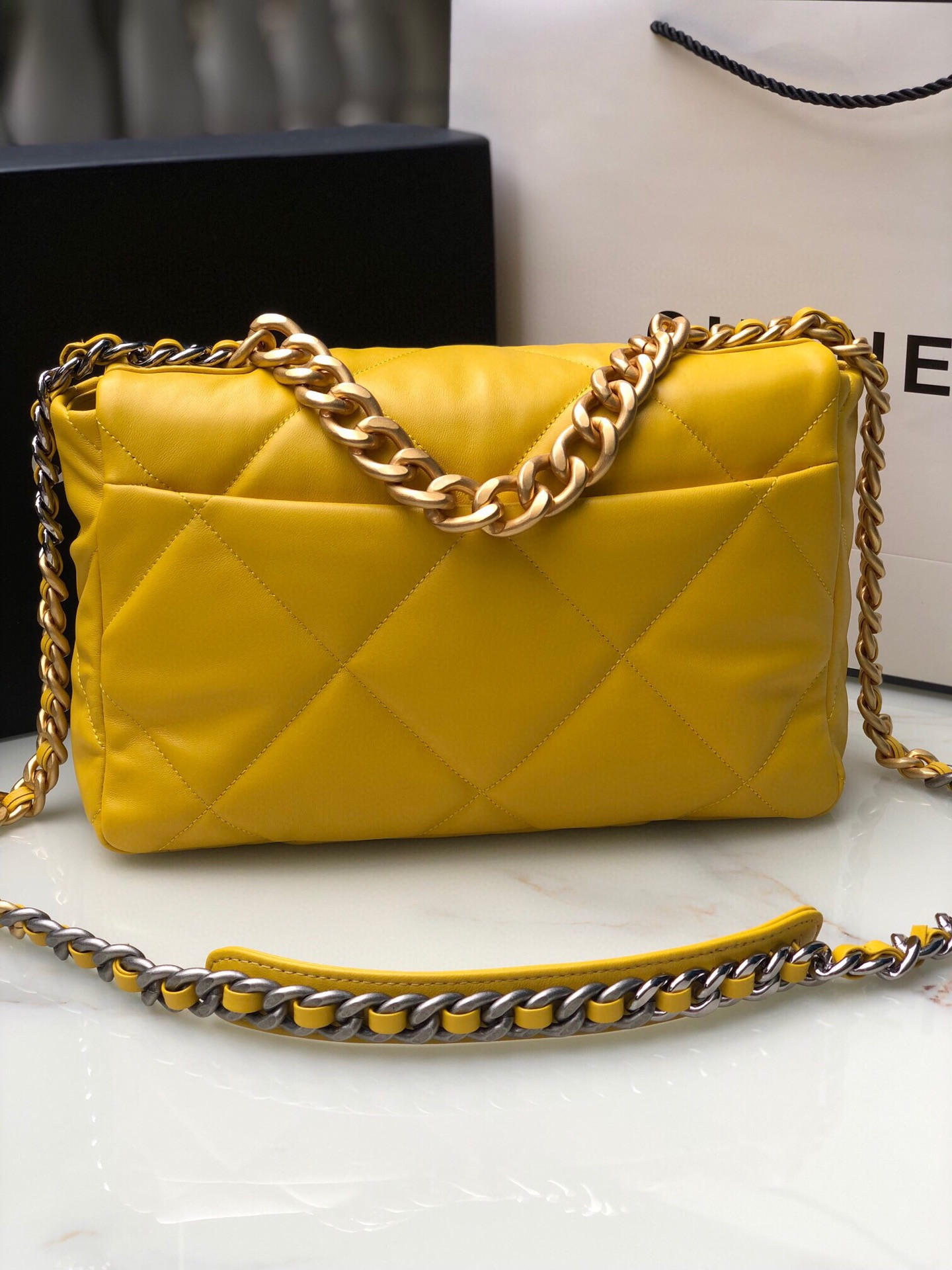Ch**el 19 LARGE HANDBAG Shiny Leather, Gold-Tone, Silver-Tone & Ruthenium-Finish Metal Yellow 7.8 × 11.7 × 3.9 in