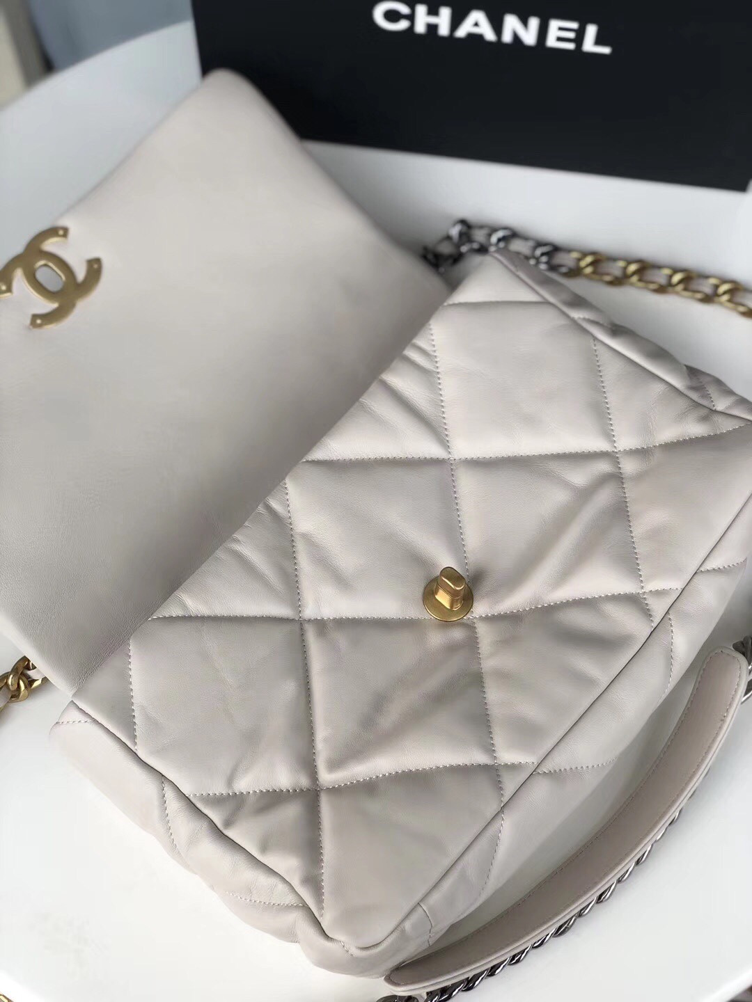 Ch**el 19 LARGE HANDBAG Shiny Leather, Gold-Tone, Silver-Tone & Ruthenium-Finish Metal Beige 7.8 × 11.7 × 3.9 in
