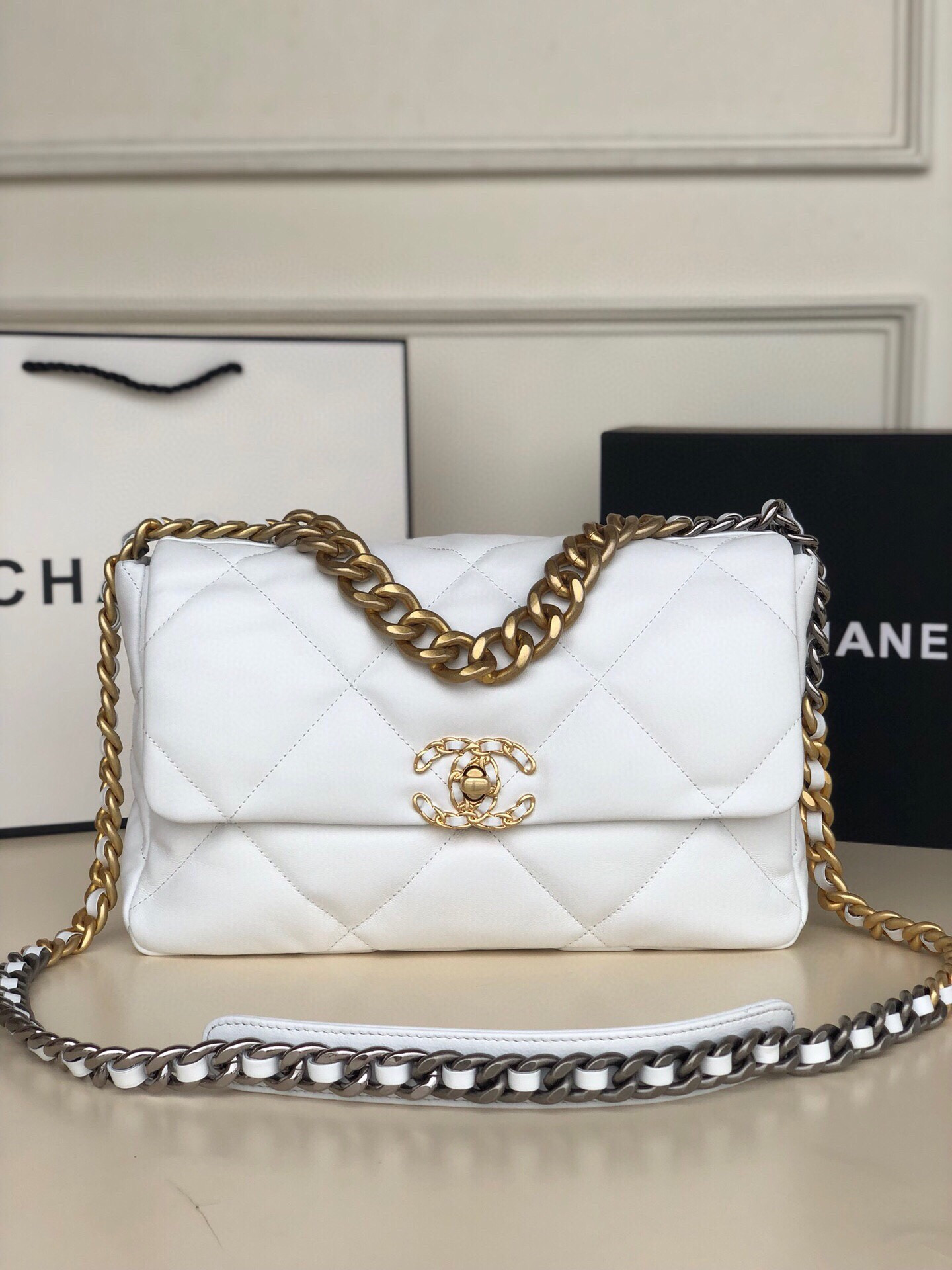 Ch**el 19 LARGE HANDBAG Shiny Leather, Gold-Tone, Silver-Tone & Ruthenium-Finish Metal White 7.8 × 11.7 × 3.9 in