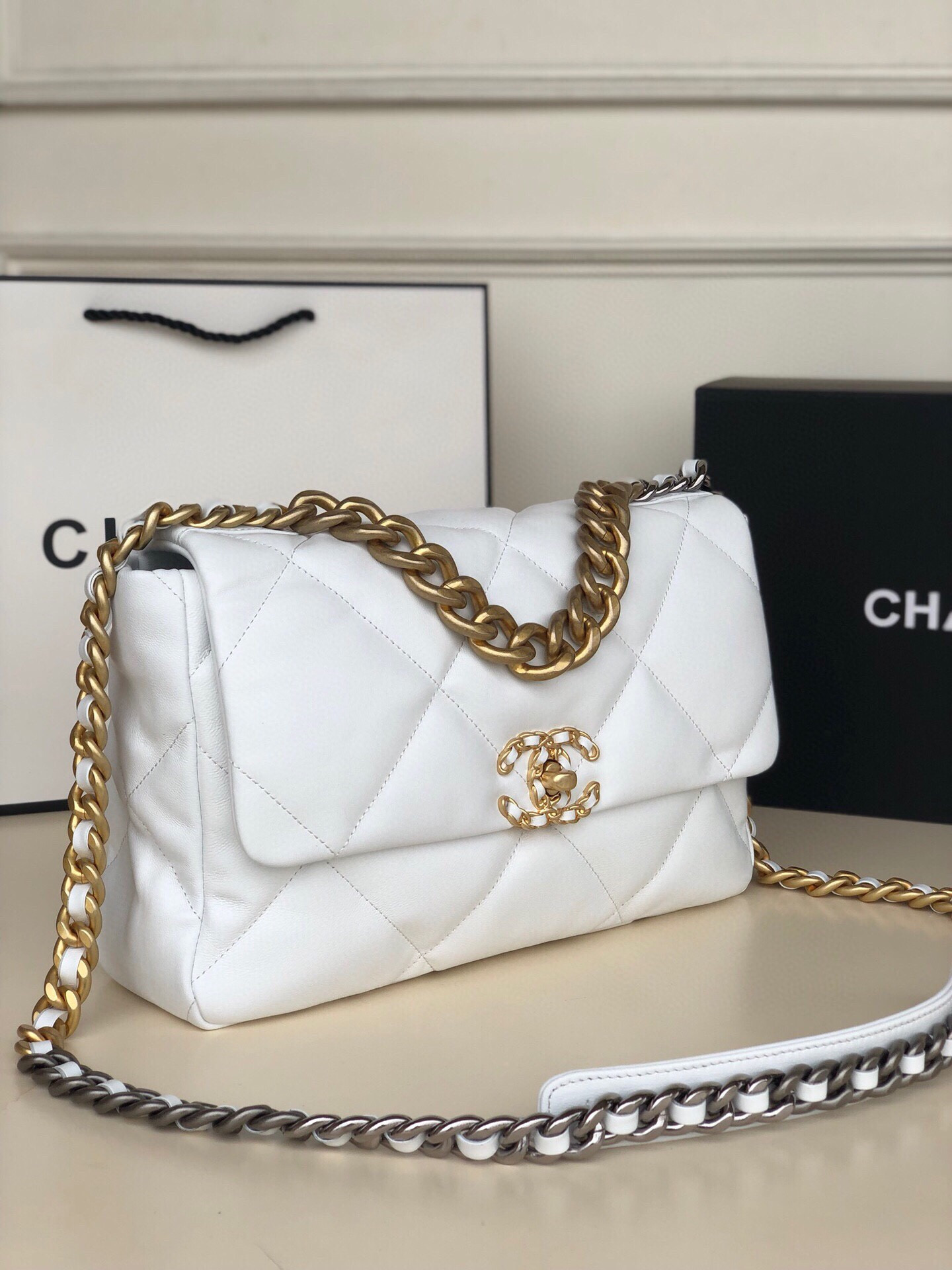 Ch**el 19 LARGE HANDBAG Shiny Leather, Gold-Tone, Silver-Tone & Ruthenium-Finish Metal White 7.8 × 11.7 × 3.9 in
