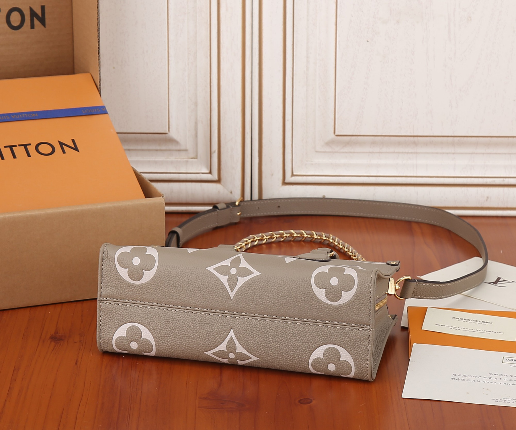 LV OnTheGo East West M23641 9.8 x 5.1 x 3.9 inches